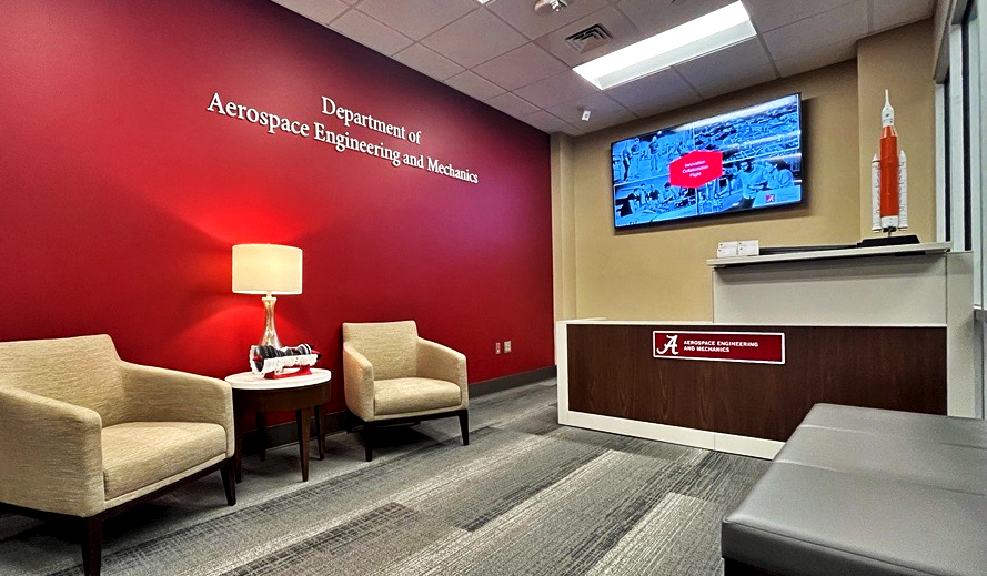 professor in blue backlit lab